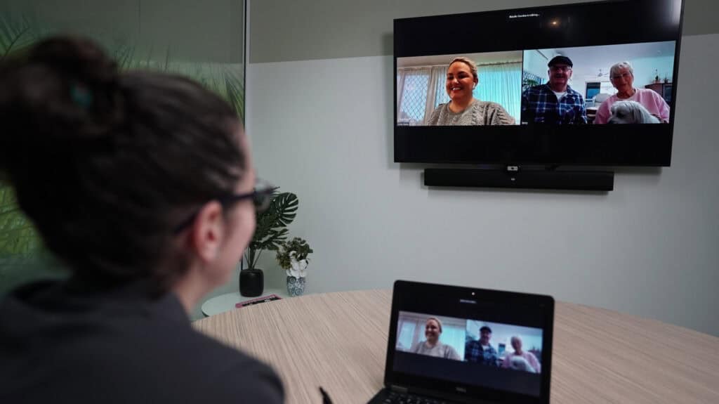 A team member of Beacon Aged Care & Retirement Advisers during a virtual meeting with clients